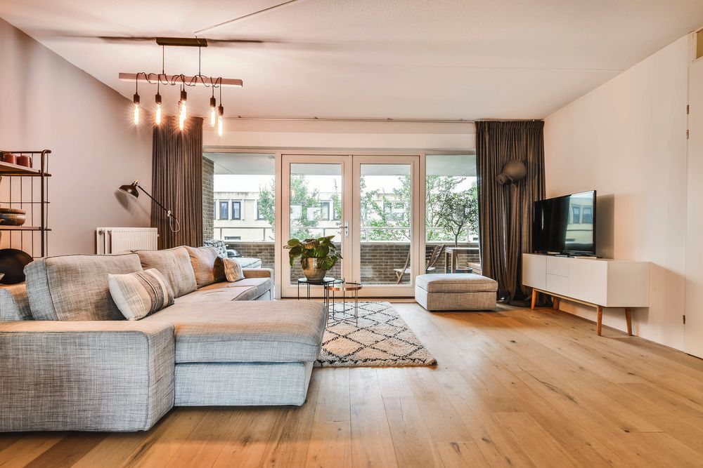 Spacious living room with large windows